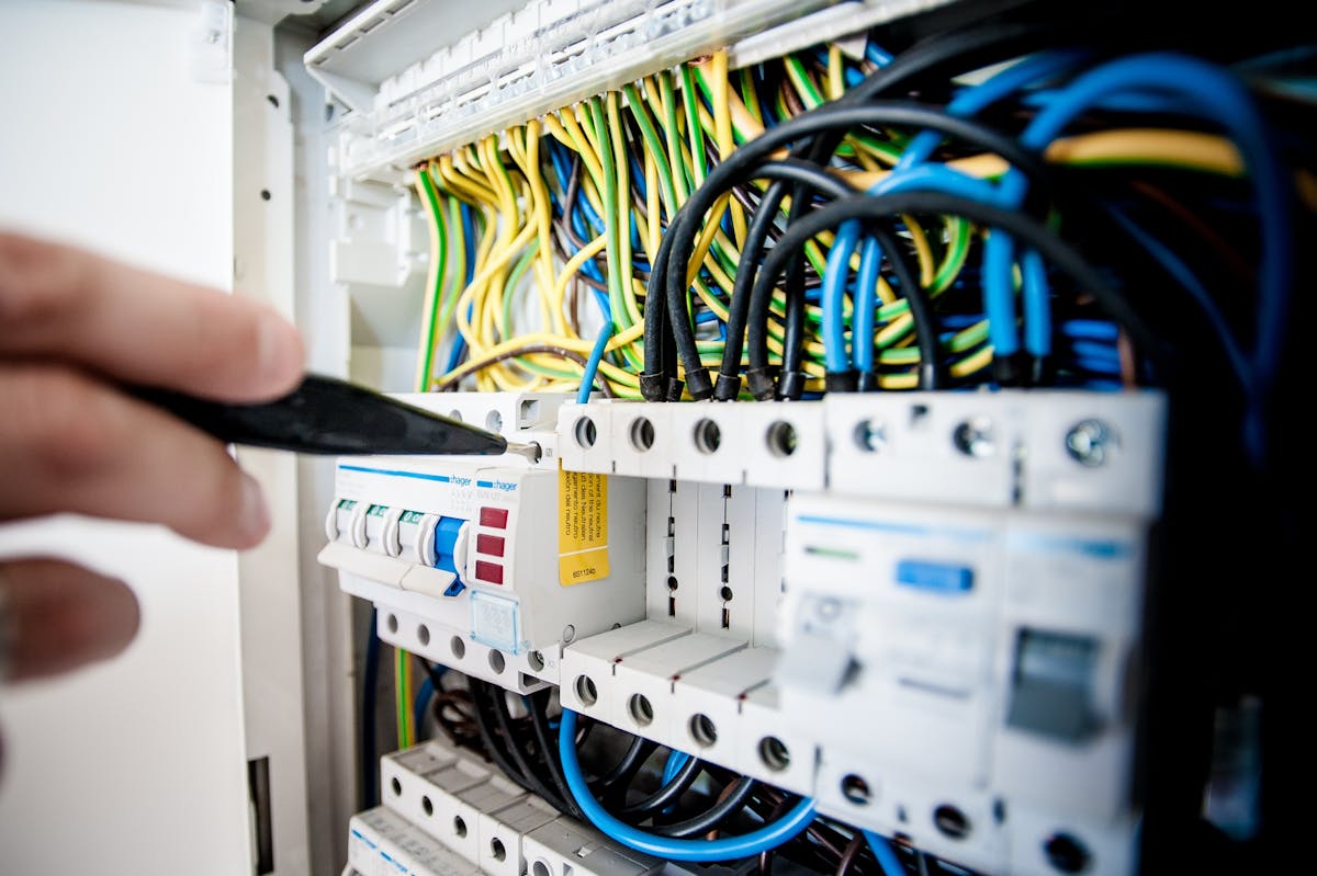 Licensed electrician checking home electrical panel - Briden Electrical Services Belleville