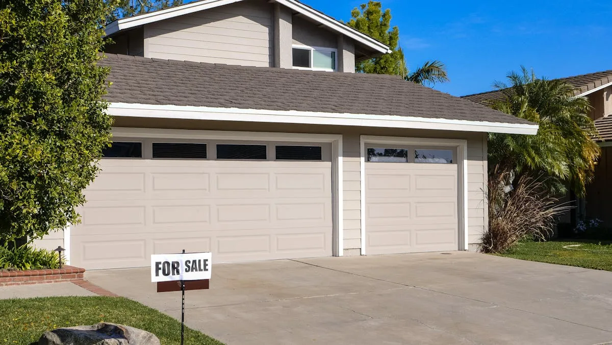 House staged for sale with for sale sign - getting best return selling your home Belleville